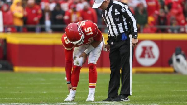 Mahomes clutches his ankle during the win over the Jaguars