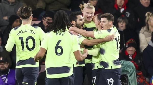 Erling Haaland is mobbed after his goal