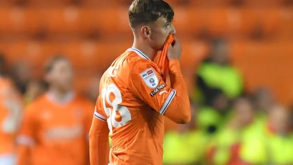 Arsenal's on-loan prospect Charlie Patino looking dejected as Blackpool are heading down to League 1 for next season