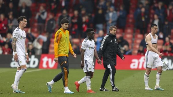 Leeds player leave the pitch after their humbling by Bournemouth