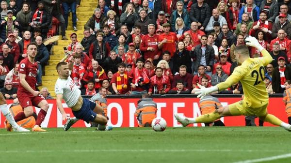 Diogo Jota slides home the dramatic winner