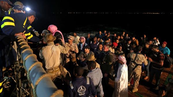 Saudi forces hoist evacuees aboard a vessel during a rescue operation from Port Sudan to Jeddah, on April 30, 2023.