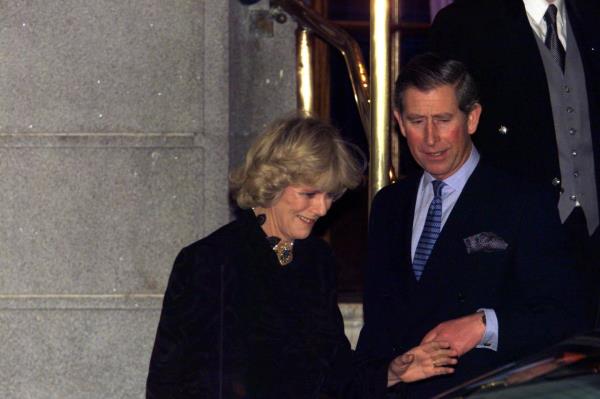 Charles and Camilla make their first public appearance as a couple after leaving a party in Lo<em></em>ndon in 1999.