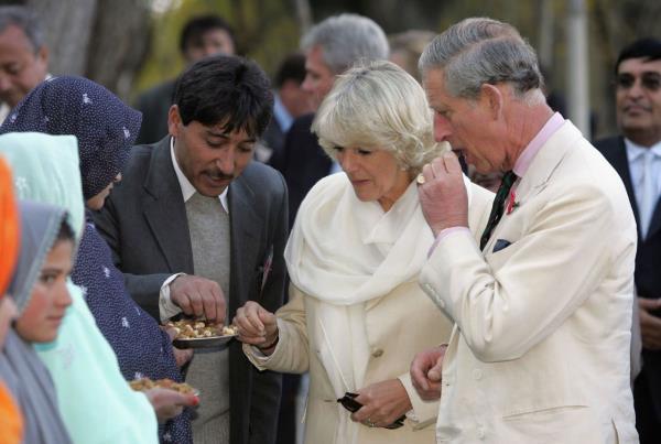 Camilla, left, and Lady Diana Spencer watch a 1980 steeplechase race in which Prince Charles was competing. Charles and Diana married in 1981.