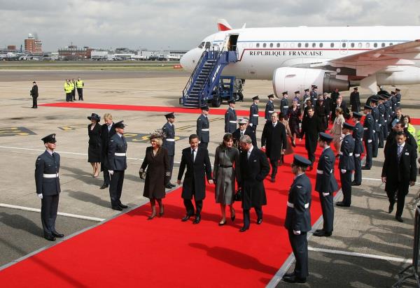 French President Nicolas Sarkozy and his wife, Carla Bruni-Sarkozy, are greeted by Charles and Camilla after arriving in England in March 2008.