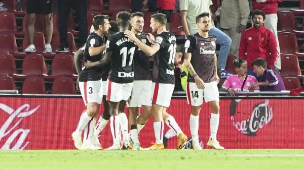 Athletic Bilbao players celebrate their late equaliser