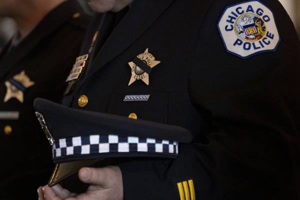 A Chicago Police Department detective attends a police graduation ceremony at Navy Pier, March 7, 2023.