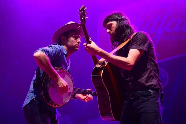 Scott and Seth Avett, seen performing in Charlotte in 2018, were eager participants in helping create the musical “Swept Away.” They even co<em></em>ntributed some new music and lyrics for the show..