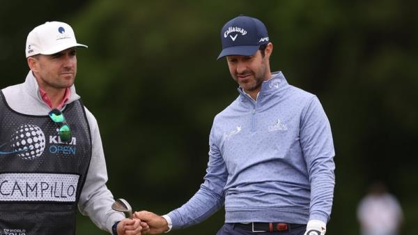 Jorge Campillo (R) pictured with his caddie on the seventh hole