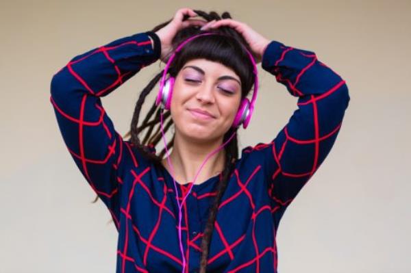 Young Woman Listening to Music