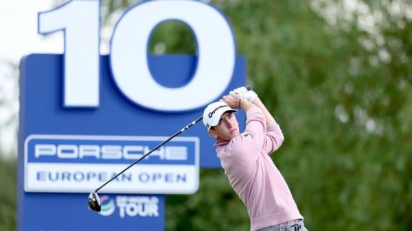 Tom McKibbin plays his tee shot on the 10th hole