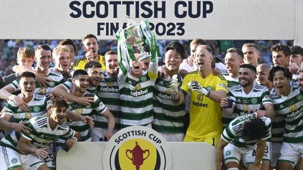 Celtic captain Callum McGregor lifts the Scottish Cup