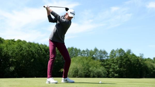 McKibbin tees off on the sixth hole