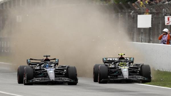 George Russell (L) and Mercedes' team-mate Lewis Hamilton came together during qualifying